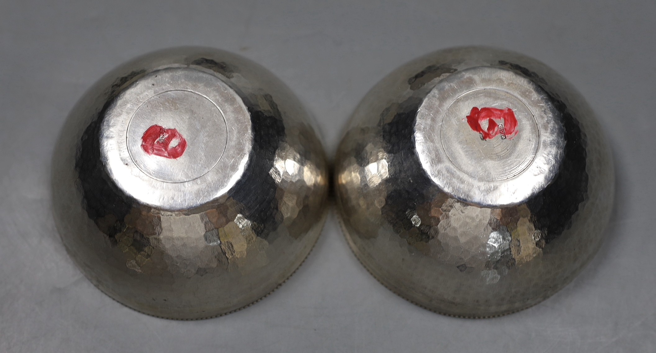 A set of five early to mid 20th century Egyptian planished white metal finger bowls, diameter 10.5cm, 22.5oz.